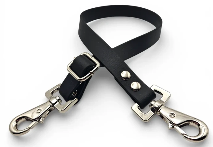 Adjustable waterproof BioThane horse fillet string in Basecamp Black with gun metal grey hardware.