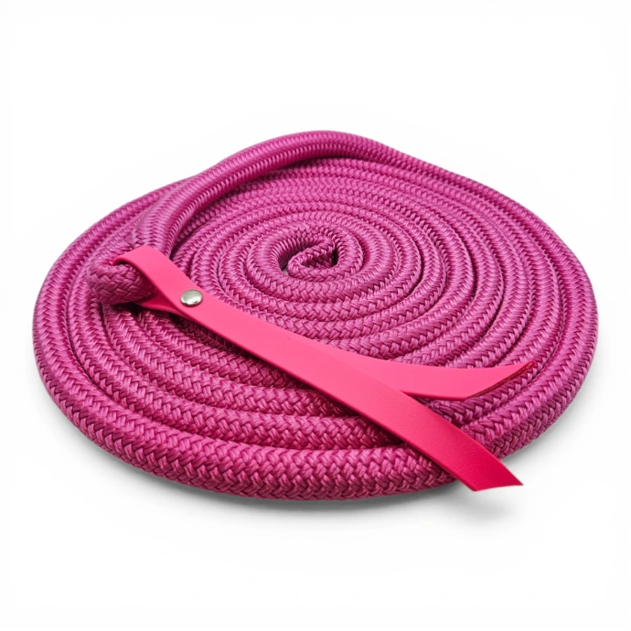 Hot pink premium rope lead for horses, featuring a waterproof, stink-proof BioThane® accent strap and a secure metal rivet. Durable, easy to clean, and made to order in East Sussex for stylish utility in any weather.